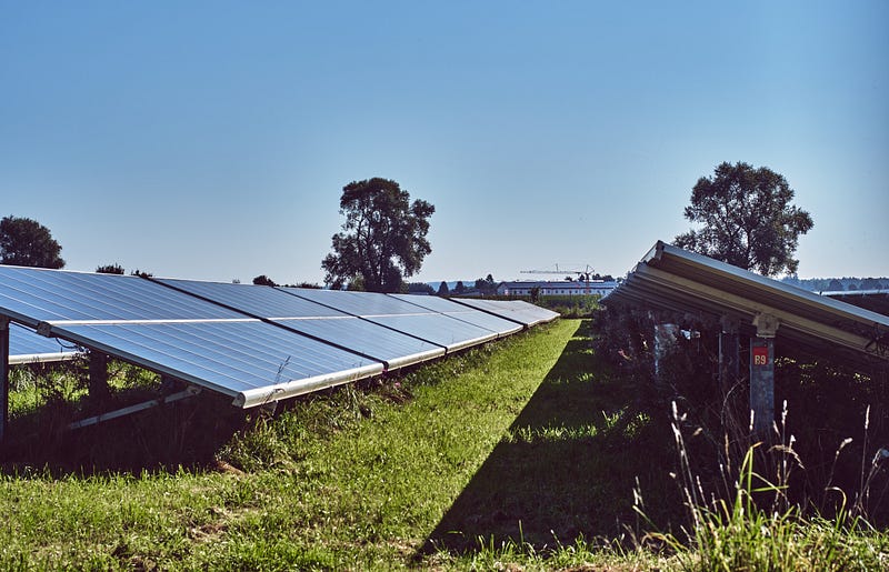 Solar farm under cloudy skies