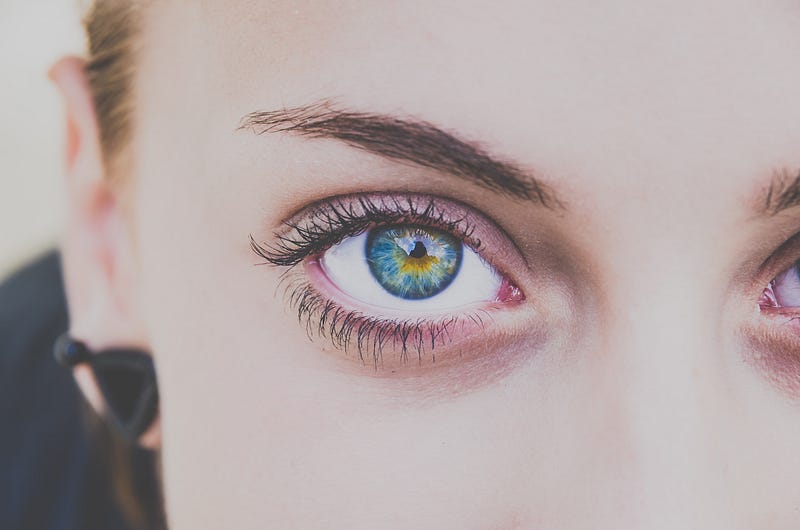 Blue eyes are often seen as charming yet cautious.