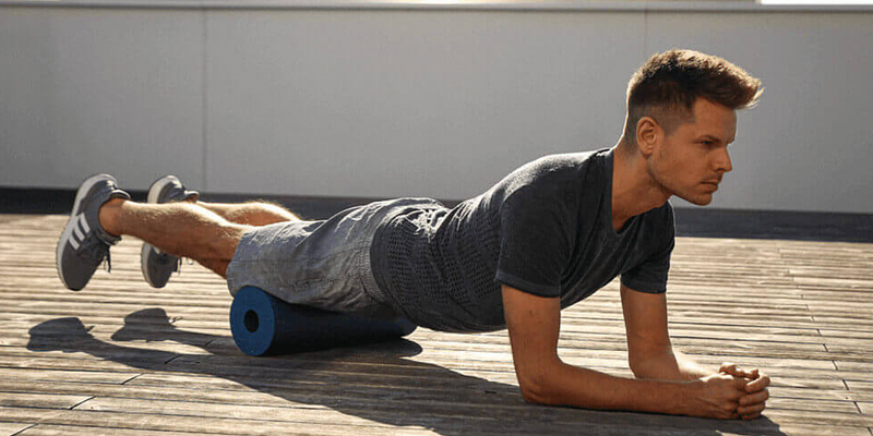 Foam rolling the quadriceps for knee health.