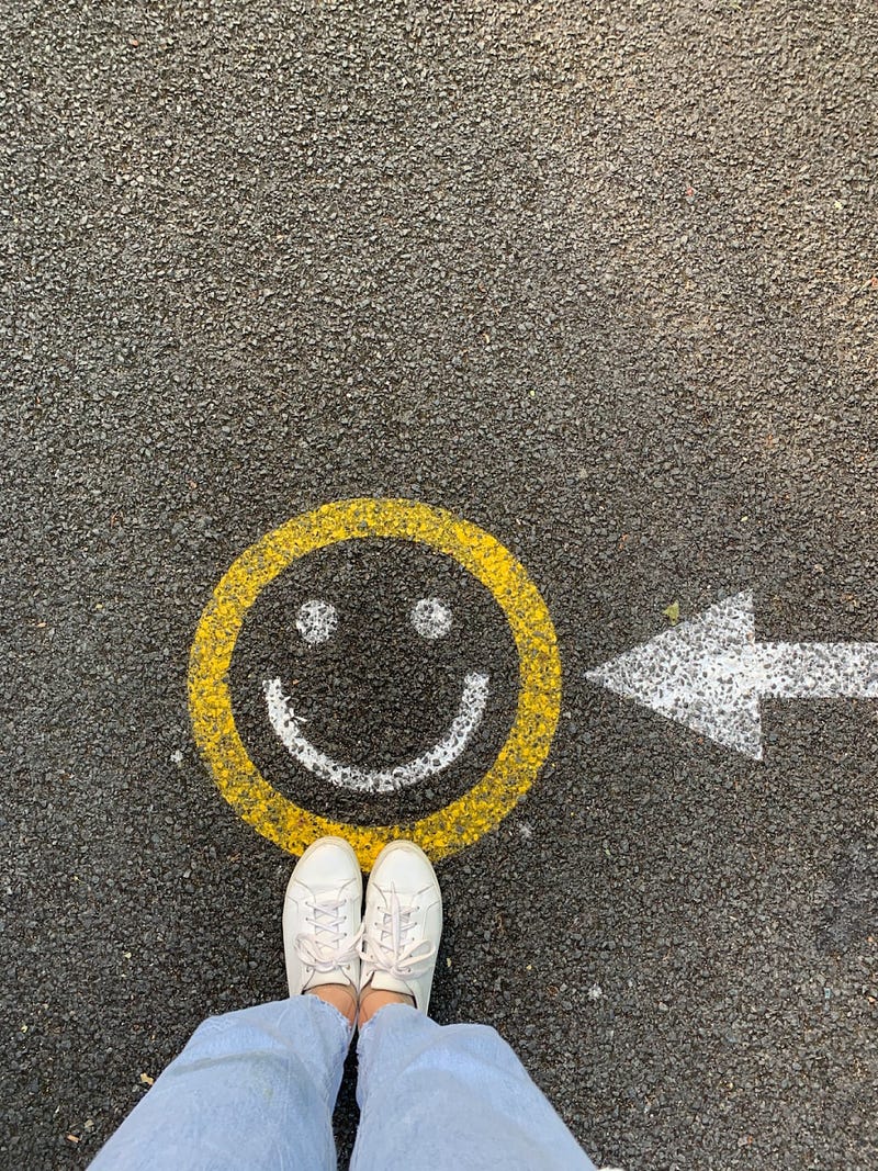 A group of friends laughing together, showcasing joy