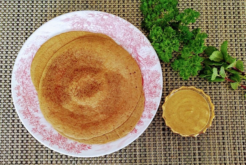 Millet pancakes served with chutney